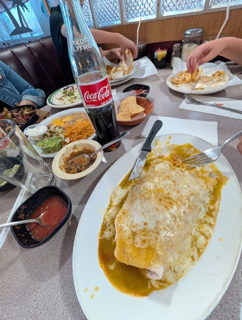 Mexican restaurant interior with table service.