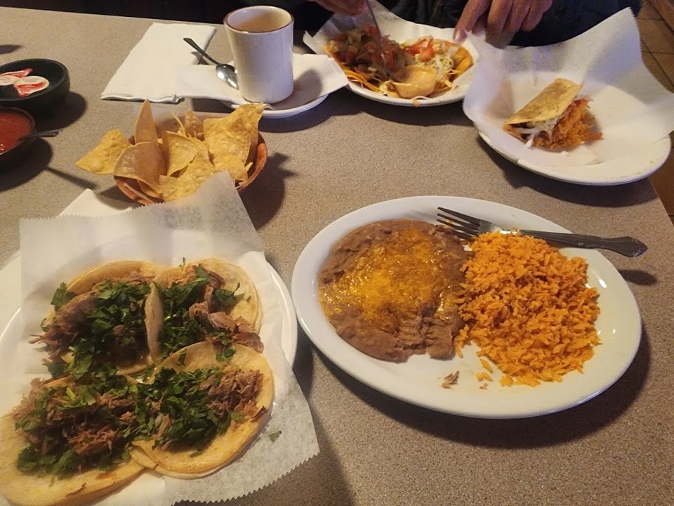 Menu page with tacos, burritos, and soups.